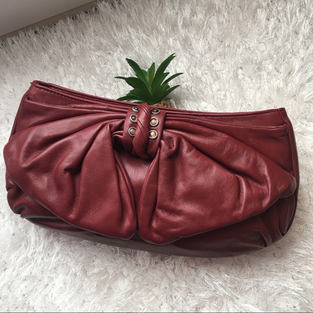 Judith Ripka leather bow clutch